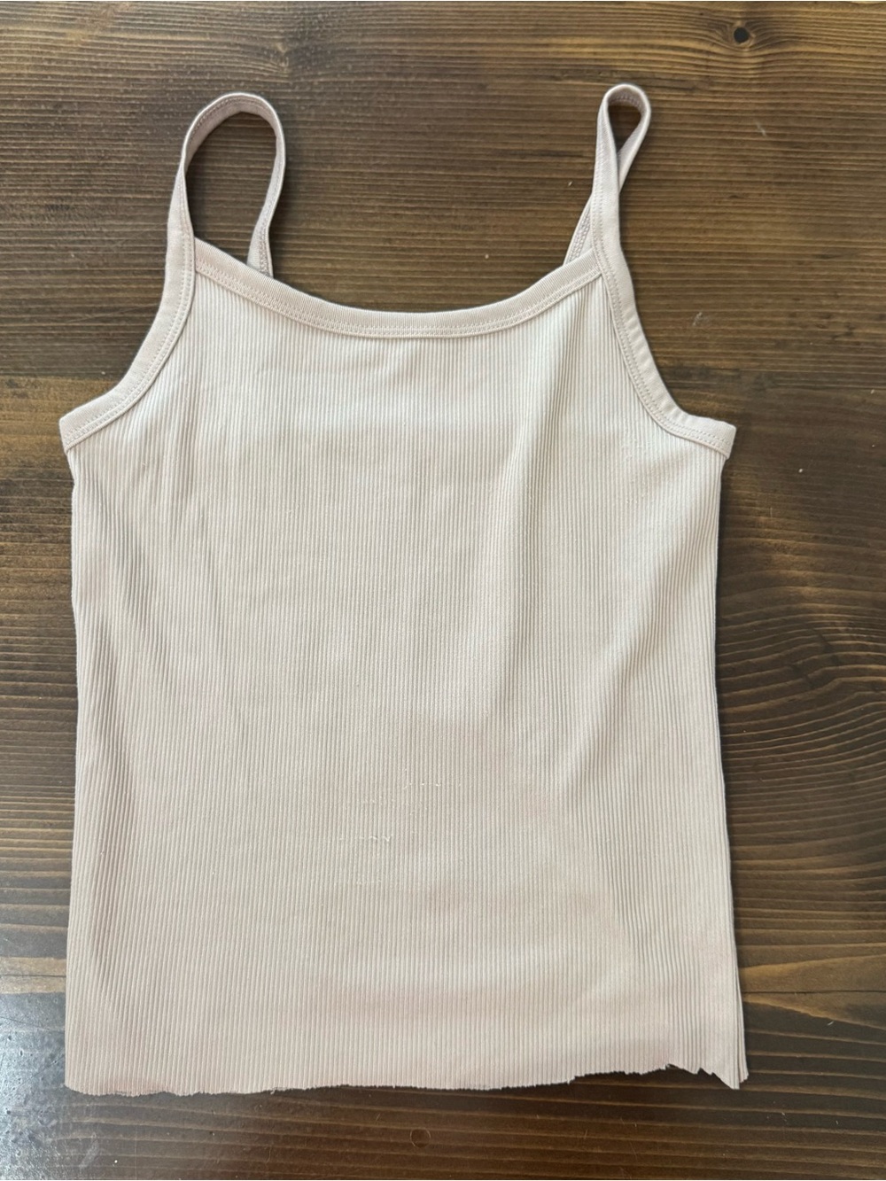 No boundaries ribbed tank top with a raw hemline. XS